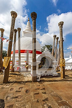 The white Thuparama dagoba with a red ribbon, Anuradhapura, Sri Lanka