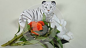 White Tiger Knick Knack with orange and white flowers