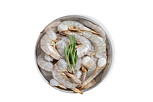 White tiger shrimps, raw prawns in a skillet with rosemary. Isolated on white background.