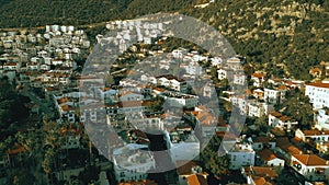 White tiled houses located on the mountain in Kas Turkey