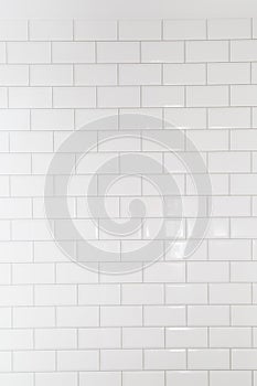 White tiles brick background. Interior of the kitchen or bathroom.