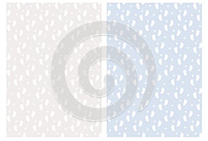 White Tiny Feet and Hearts Isolated on a Light Gray and Blue Background. Baby Shower Party Vector Decoration.