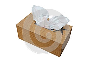 A white tissues popping out from the wooden box