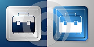 White Toolbox icon isolated on blue and grey background. Tool box sign. Silver and blue square button. Vector
