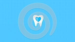 A white tooth with a blue heart on it