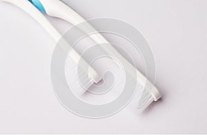 White toothbrush isolated on white background