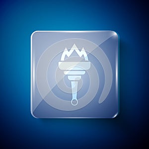 White Torch flame icon isolated on blue background. Symbol fire hot, flame power, flaming and heat. Square glass panels