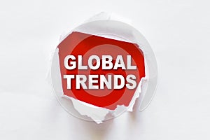 White torn paper with a word GLOBAL TRENDS