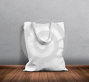White tote bag mockup with grey background photo