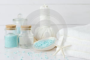 White towel with aromatherapy spa tools