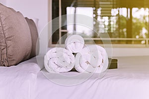 White towel in bedroom,Stack of plush hotel towels