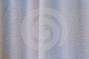 White towel textured for drying oneself or wiping things dry