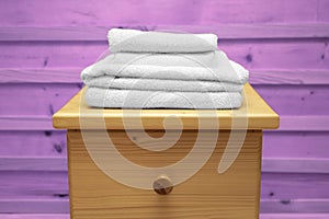 White towel on wooden cabinet