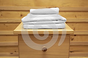 White towel on wooden cabinet
