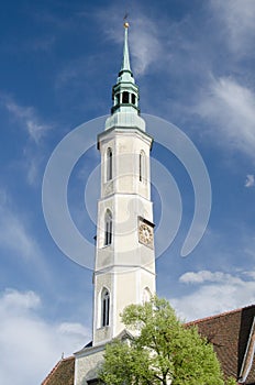 White tower with clock and the bell in Gorlitz, Germany