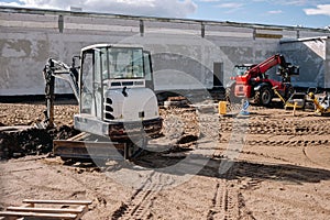 White tractor working in a construction site