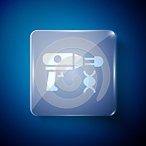 White Transfer liquid gun in biological laborator icon isolated on blue background. Square glass panels. Vector