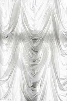 White translucent curtain with flounces on the window