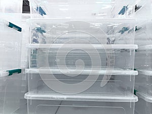 White transparent Plastic food containers on the shelf in the store