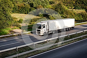 White Transportation Truck on road