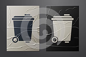 White Trash can icon isolated on crumpled paper background. Garbage bin sign. Recycle basket icon. Office trash icon