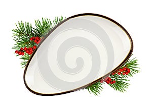 White triangle empty dish with brown edging and Christmas decorations isolated