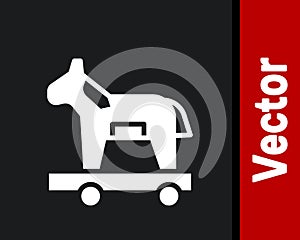 White Trojan horse icon isolated on black background. Vector