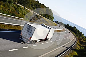 White truck on a beautyful driving route