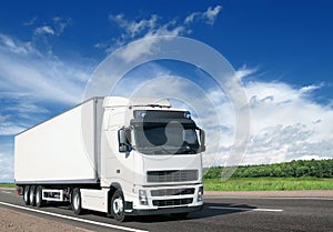 White truck on country highway