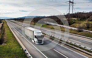 White Truck on a countryside highway