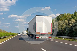White truck on highway road. Industrial transportation concept, export, import, logistic
