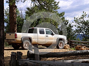 White truck parked at a lookout point