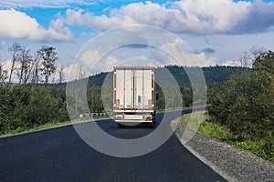 White truck transports freight