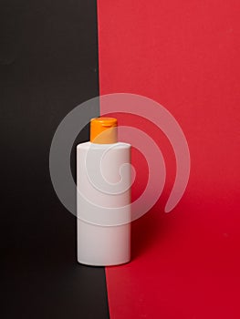 White tube bottle of shampoo, conditioner, hair rinse, mouthwash, on a background