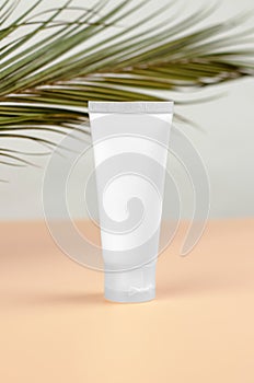 White tube of sunscreen. Moisturizing cream for hands or face