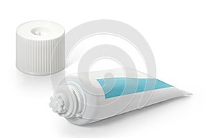 White tube of toothpaste with turquoise on a white background. Full depth of field