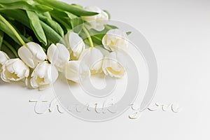 White Tulips with Thank You Message on Bright Background