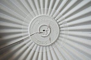 White tupperware cap