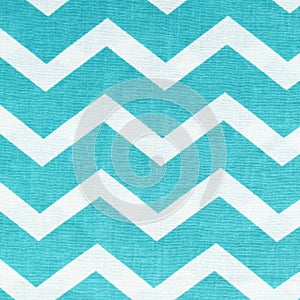 White and turquoise cotton fabric texture with chevron design