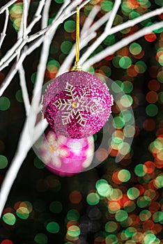 White twigs with Christmas tree baubles