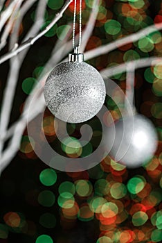 White twigs with Christmas tree baubles