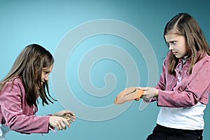 White twin sisters having conflict