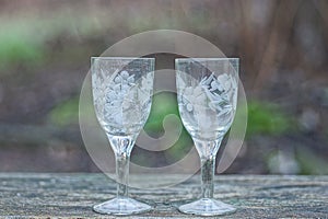 White two small glass crystal goblets
