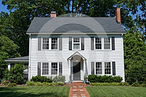 White two-story house built in the 1930s