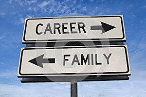White two street signs with arrow on metal pole with word career and family