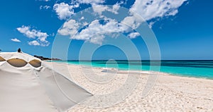 White umbrella on beautiful Shoal Bay beach in Anguilla.