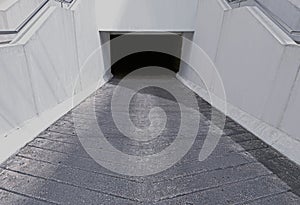 White underground parking entrance