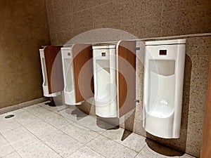 White urinal room in men\'s restroom Background image texture material