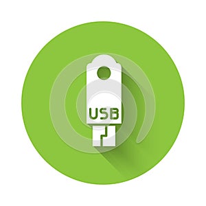 White USB flash drive icon isolated with long shadow. Green circle button. Vector Illustration