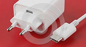 White USBC Power Adapter and Cable on Red Background type